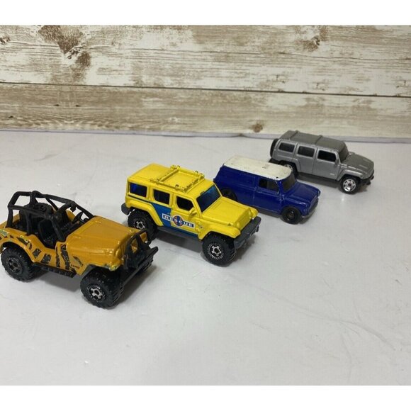 Mixed Lot Of 4 Matchbox Cars Jeep Rescue Austin Mini Hummer More - Picture 1 of 16